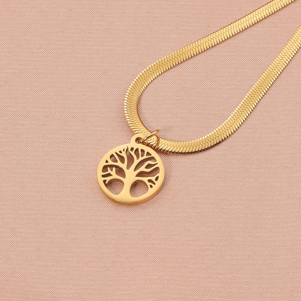 Stainless steel necklace with tree pendant on an adjustable snake bone chain in gold colour.