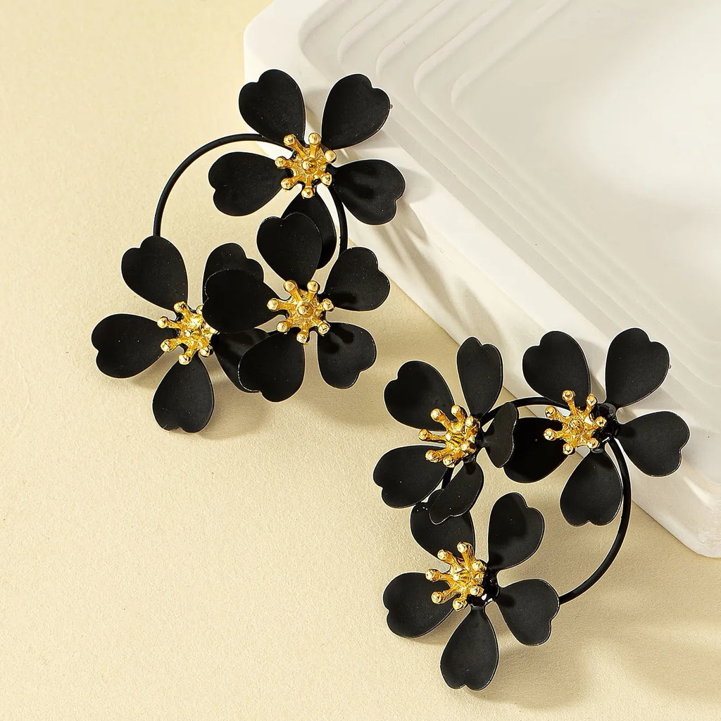 Retro floral earrings for women in black or white with iron construction and baking varnish finish