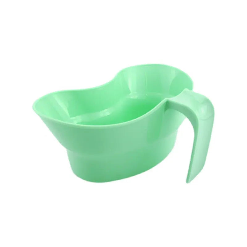 Green plastic gargle cup with spout for bedridden patient oral hygiene assistance