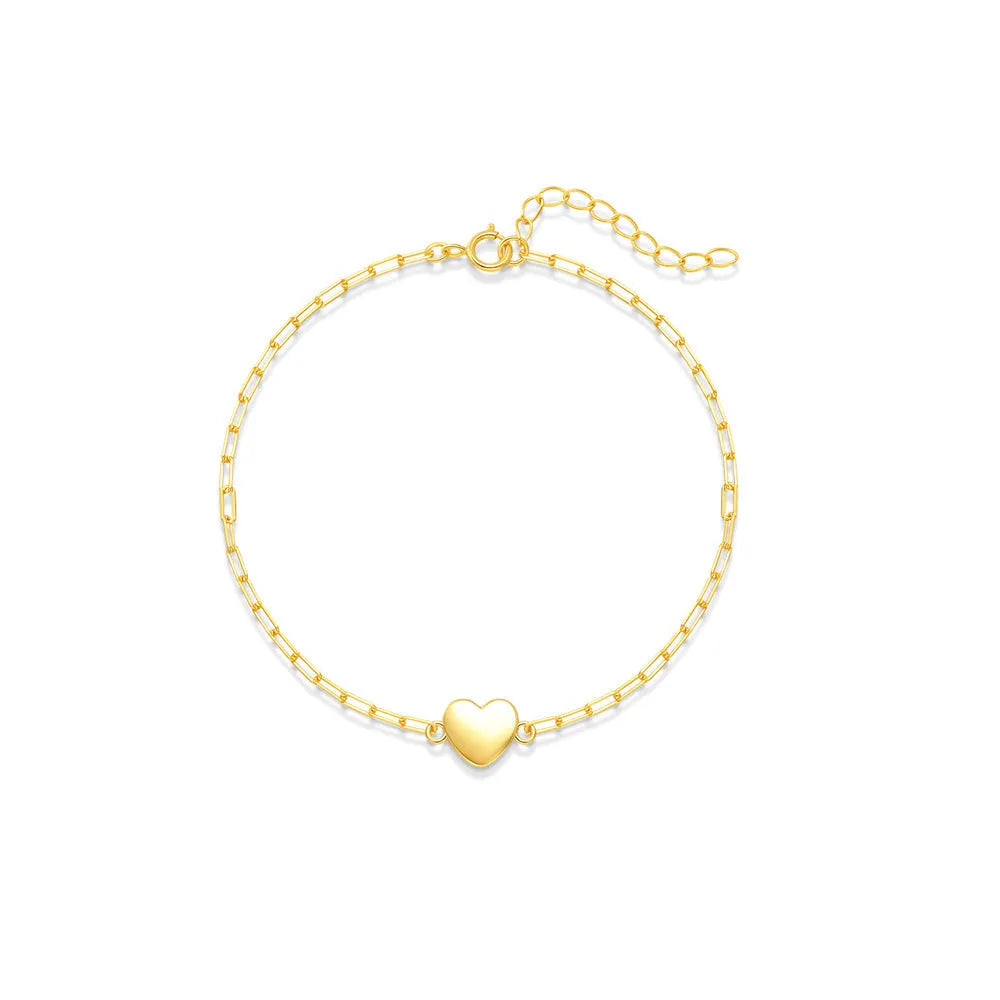 Gold plated sterling silver bracelet with geometric heart charm and clip chain clasp