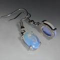Moonlight white opal earrings with retro cross design and ellipse drop shape