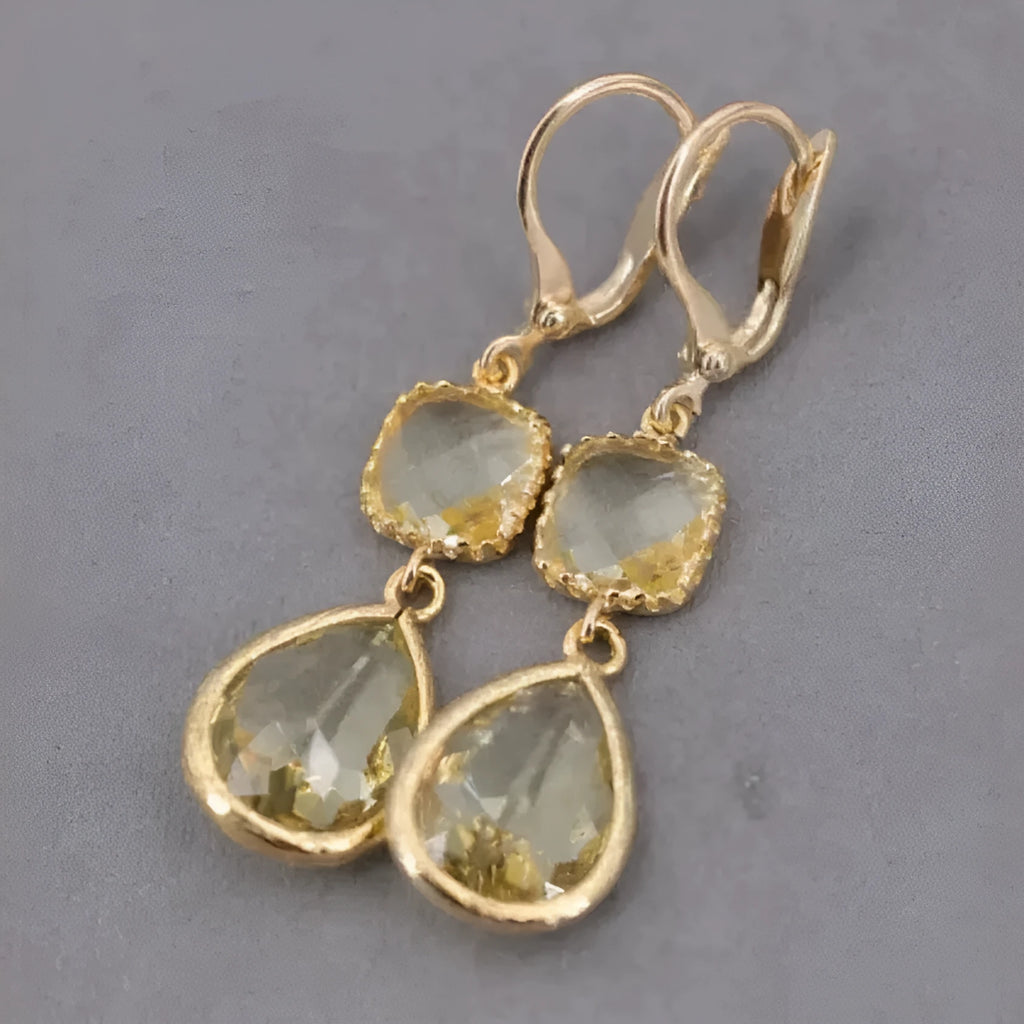 Gold geometric long fringe drop earrings with exaggerated crystal and water droplet design