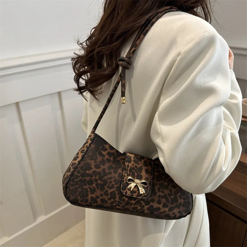 Women's casual PU leather handbag with sandwich pocket design in black, brown, coffee, or khaki colours