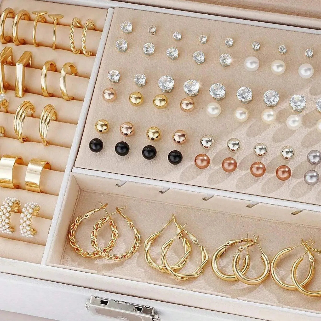 108 geometric pearl earrings with round elements and gold electroplated finish displayed as bulk set