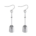 Long geometric shovel-shaped earrings with ancient silver finish and ethnic styling