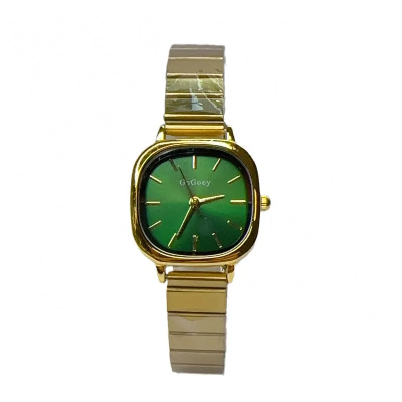 Women's quartz watch with metal case, steel strap and folding buckle, shown in gold or silver with green, white or gold surface