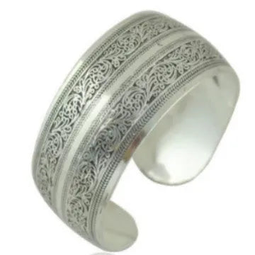 Miao-inspired ethnic bracelet with carved open design in elephant colour Roman shape