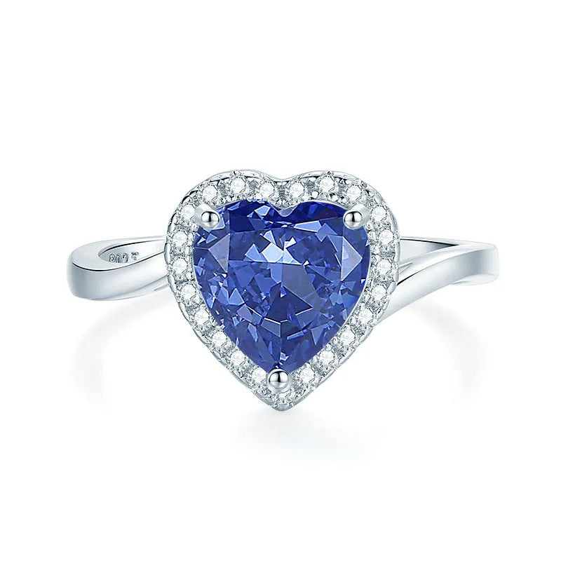 Heart-shaped sterling silver ring with a High Carbon Diamond and tan sang colour zircon stones.