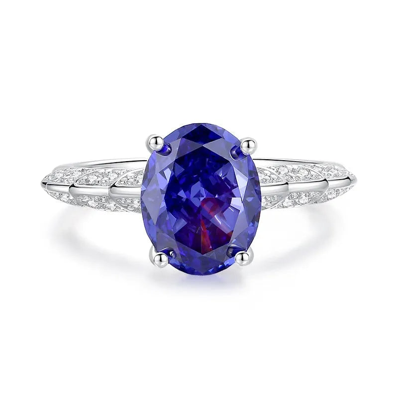 Heart-shaped sterling silver ring with a High Carbon Diamond and tan sang colour zircon stones.