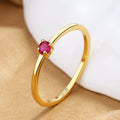 Copper geometric ring with single diamond accent in fine circle shape available in multiple colours
