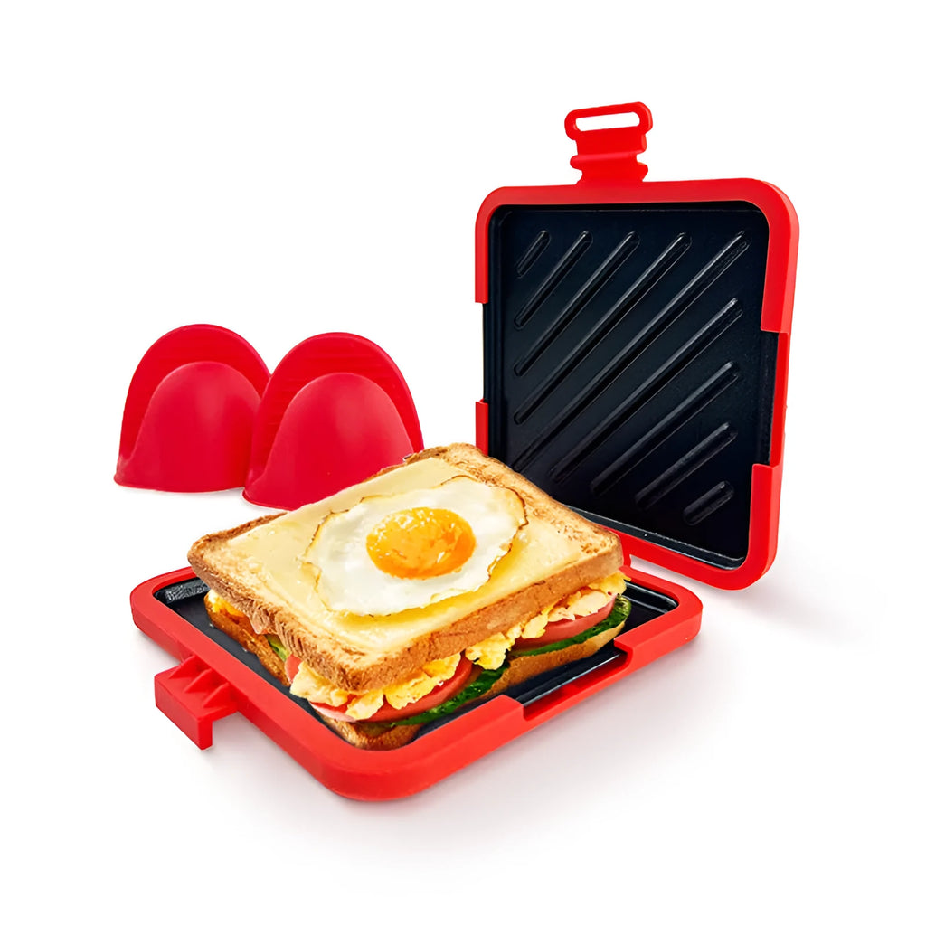 Red silicone baking tray with integrated handbag grip and matching heat-resistant gloves
