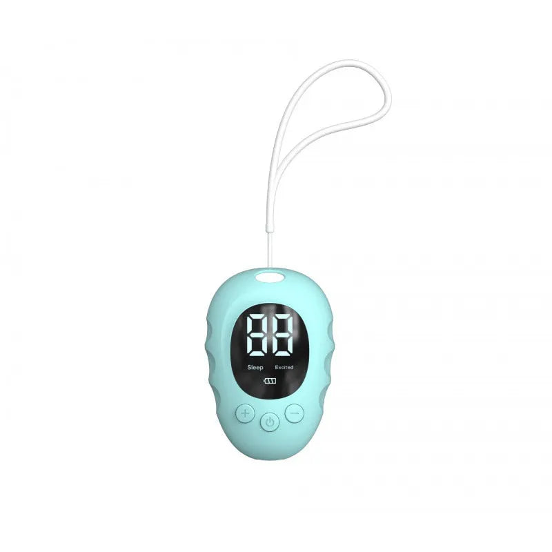 White silicone sleep aid hand grip with a sleep monitor and charging cable