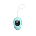 White silicone sleep aid hand grip with a sleep monitor and charging cable