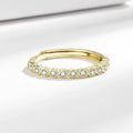 Women's geometric open ring with a diamond tail detail in a white gold or yellow gold colour finish.