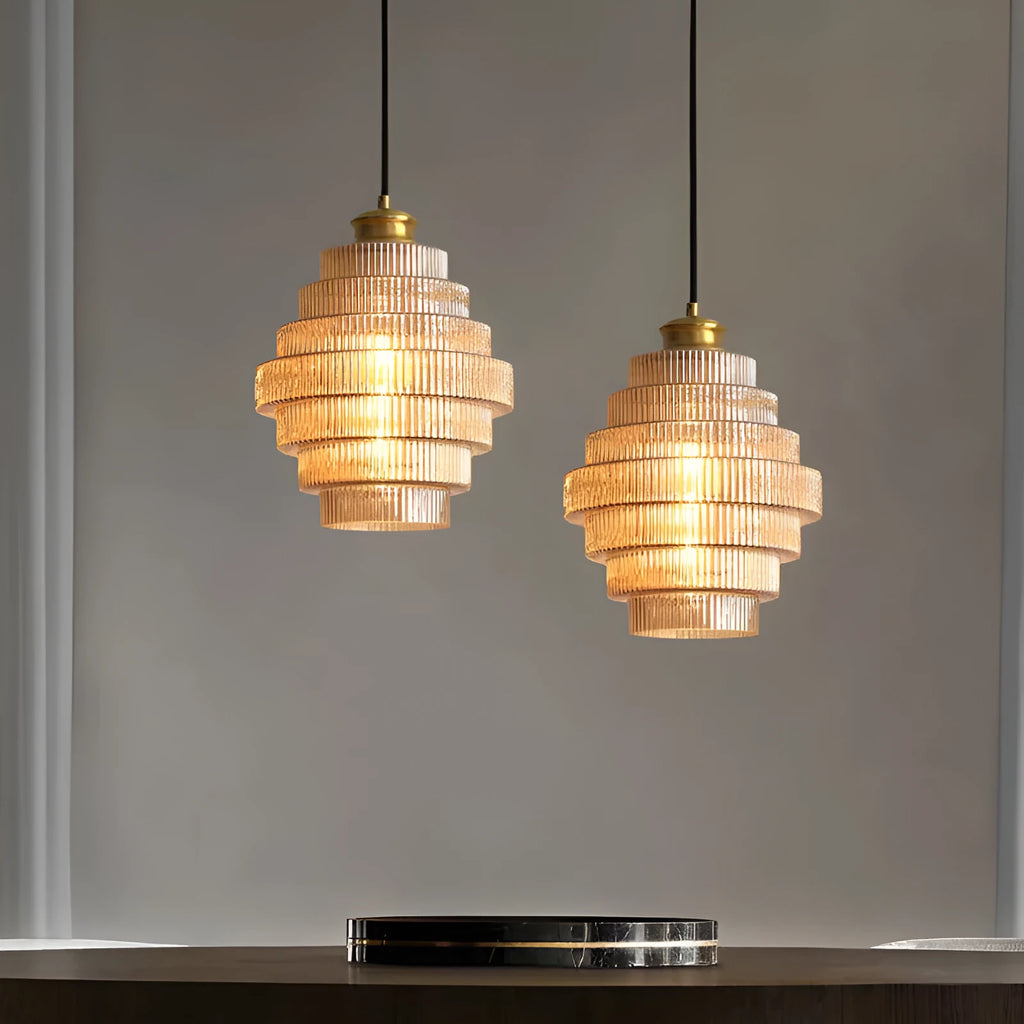 Modern simple pendant drop light in smoked grey or amber glass for hallway or bedroom.