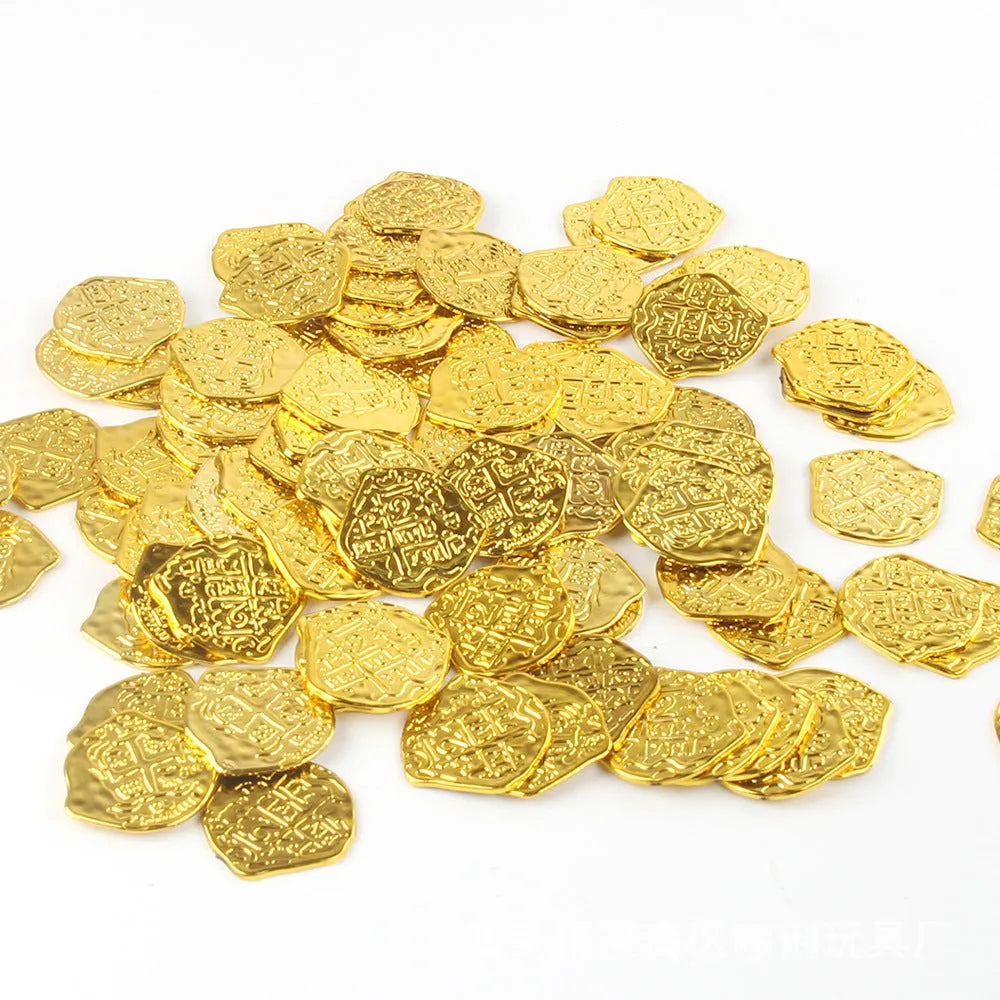 A pile of replica Roman coins in bronze, gold, and silver metallic finishes.