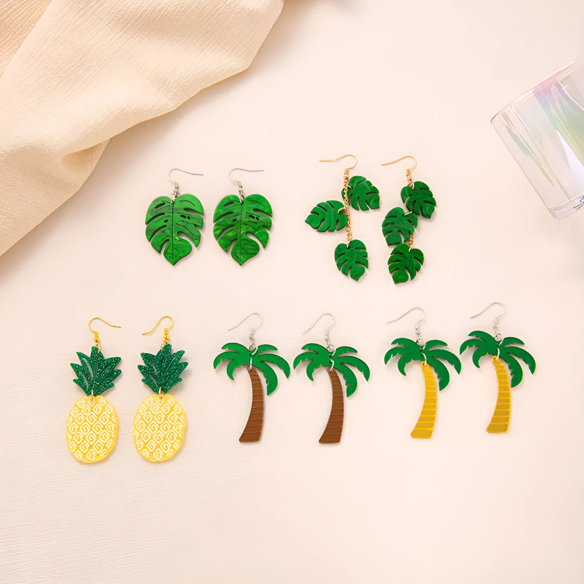 Pair of acrylic jackfruit and coconut drop earrings on alloy hooks for women.