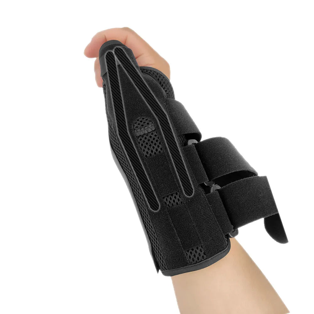 Black carbon fibre sports wrist guard with grey edging and an adjustable thumb strap for left or right hand.