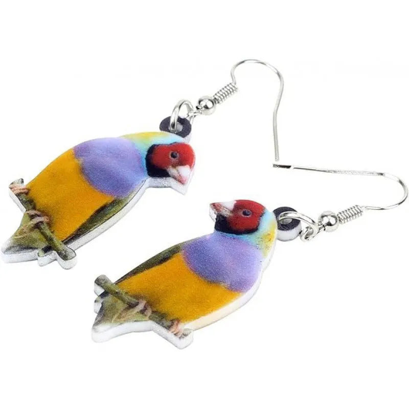 A pair of acrylic pendant earrings with a printed Blue Titmouse and snake design on geometric shapes.
