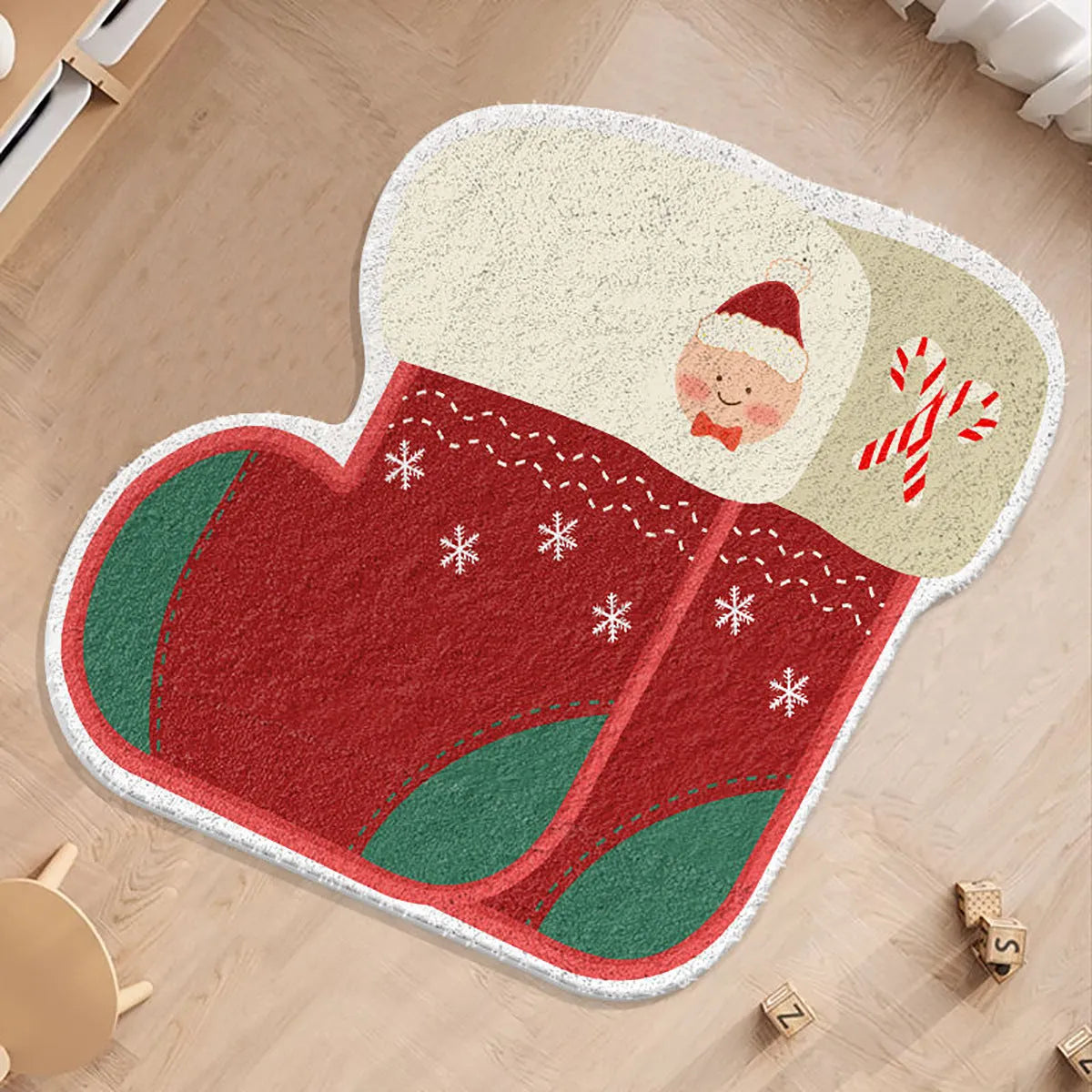 Christmas round carpet with alien shape in imitation cashmere, showing gingerbread man and holiday colour patterns