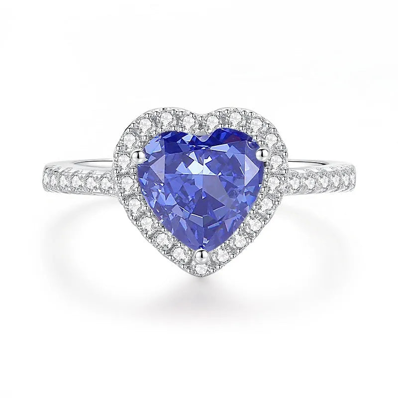 Heart-shaped sterling silver ring with a High Carbon Diamond and tan sang colour zircon stones.