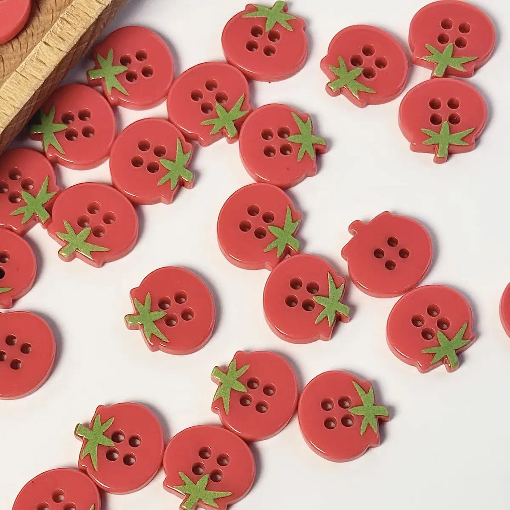 Mini tomato red fabric simulation button with vintage antique style on white background