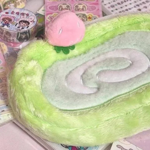 Honeydew roll plush velvet pencil case with Swiss roll cake design and zipped closure