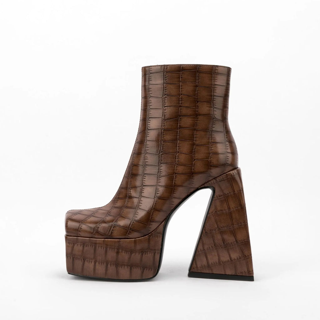 Women's ankle boot with a high heel in a solid colour, shown in a choice of red, green, black, beige, or brown.