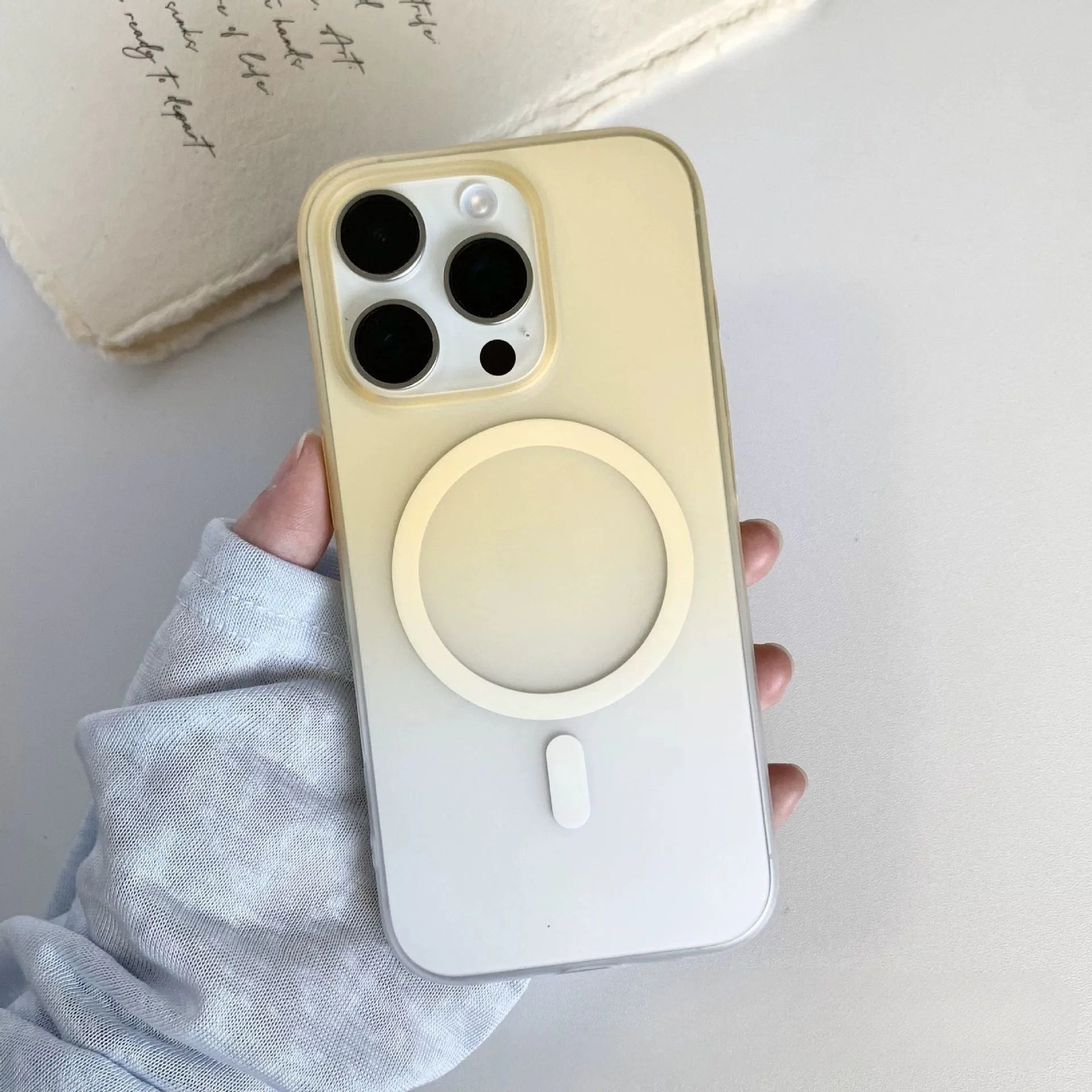 Frosted gradient colour magnetic suction iPhone case shown on a phone, displaying ultra-thin profile.