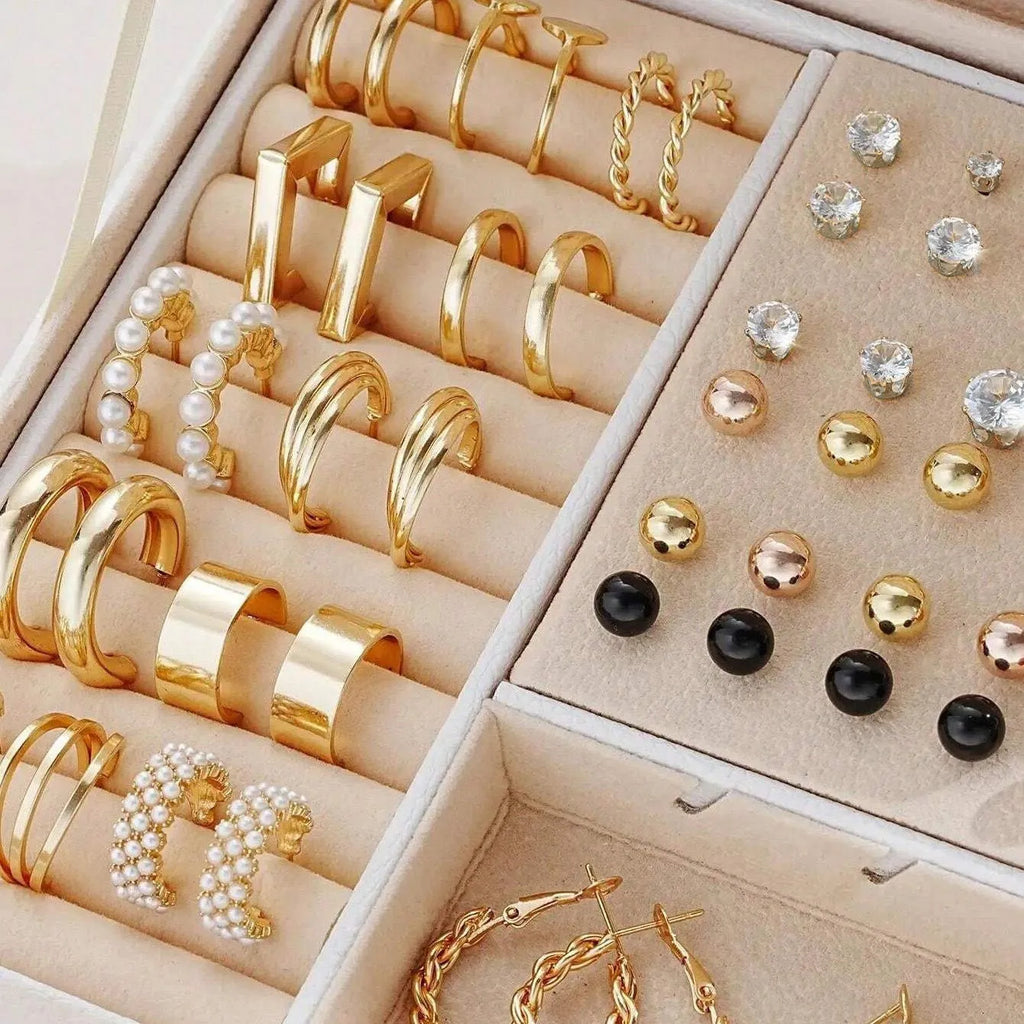108 geometric pearl earrings with round elements and gold electroplated finish displayed as bulk set