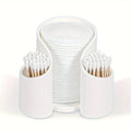 Solid colour plastic dental floss storage box with integrated cotton swab holder.