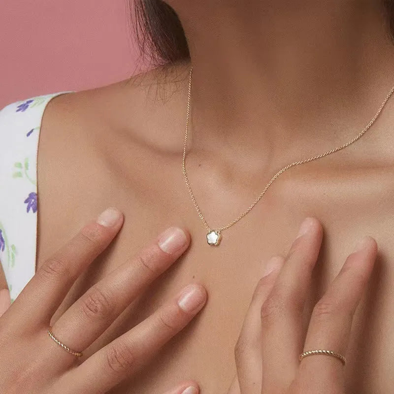 White Mother Pearl shell flower necklace on a gold or silver O-chain for women.