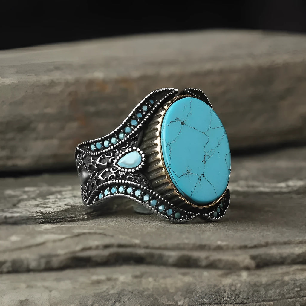 Men's antique silver alloy ring with turquoise colour on a round smooth band.