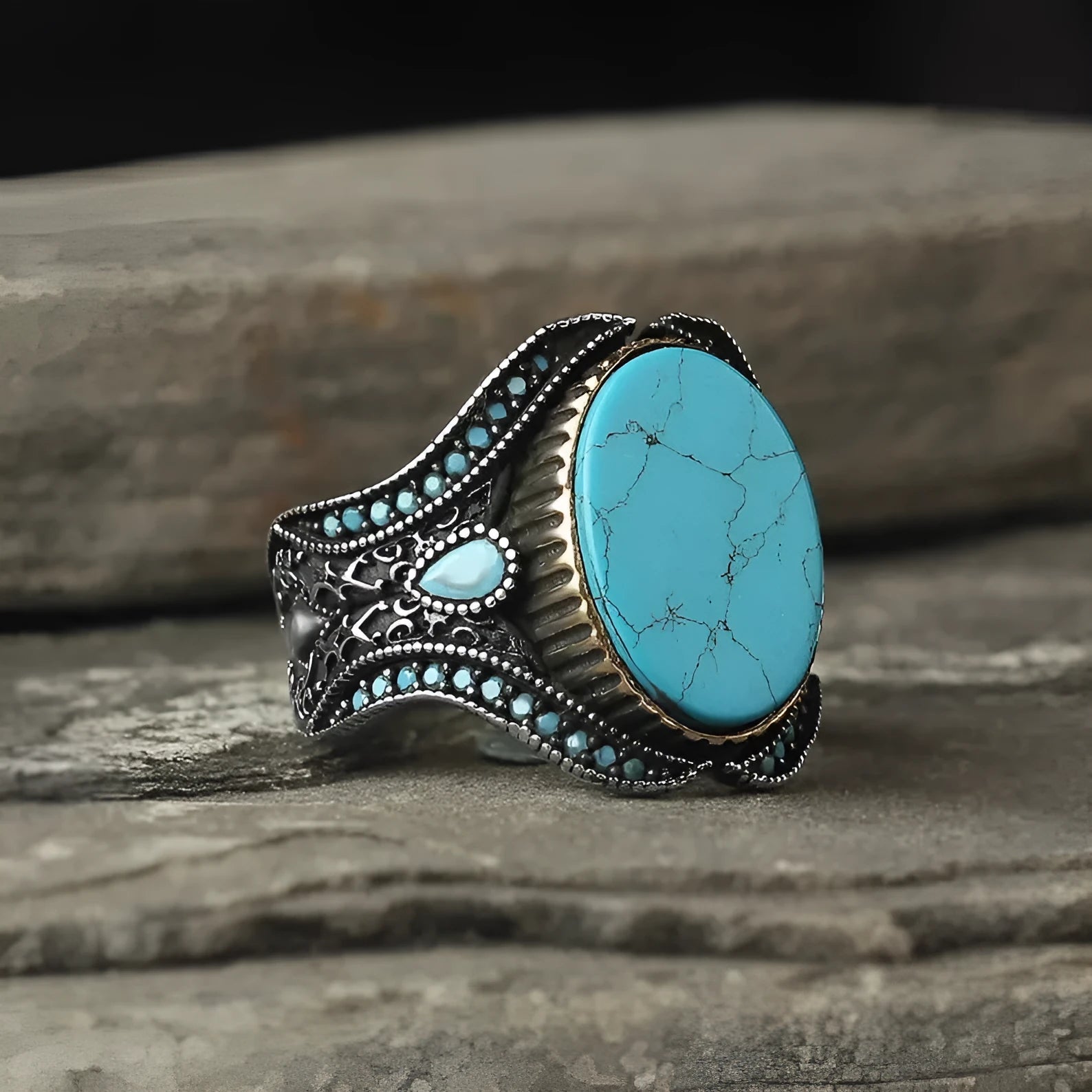 Men's antique silver alloy ring with turquoise colour on a round smooth band.