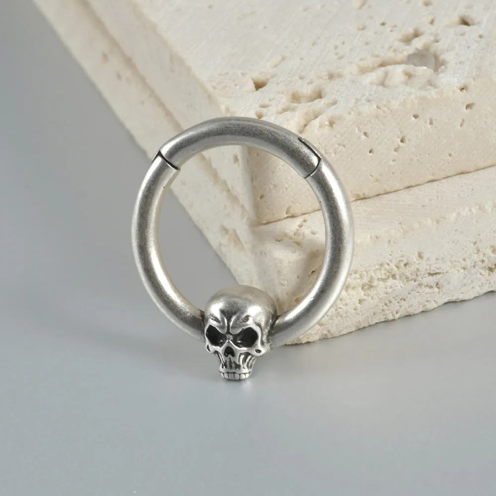 Copper punk earrings with ghost head design in antique silver or gold finish