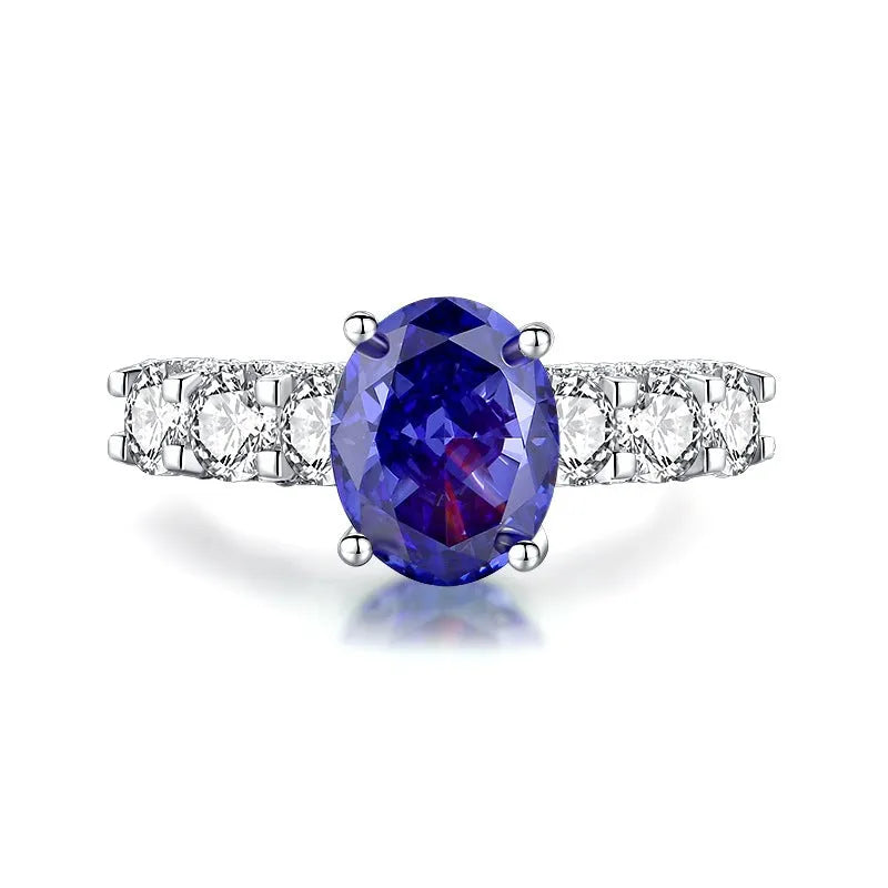 Heart-shaped sterling silver ring with a High Carbon Diamond and tan sang colour zircon stones.
