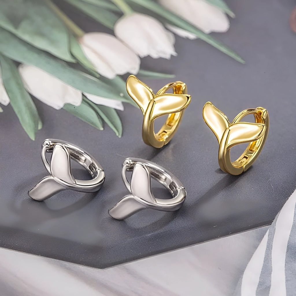 Women's copper fishtail earrings with electroplated white or yellow gold finish