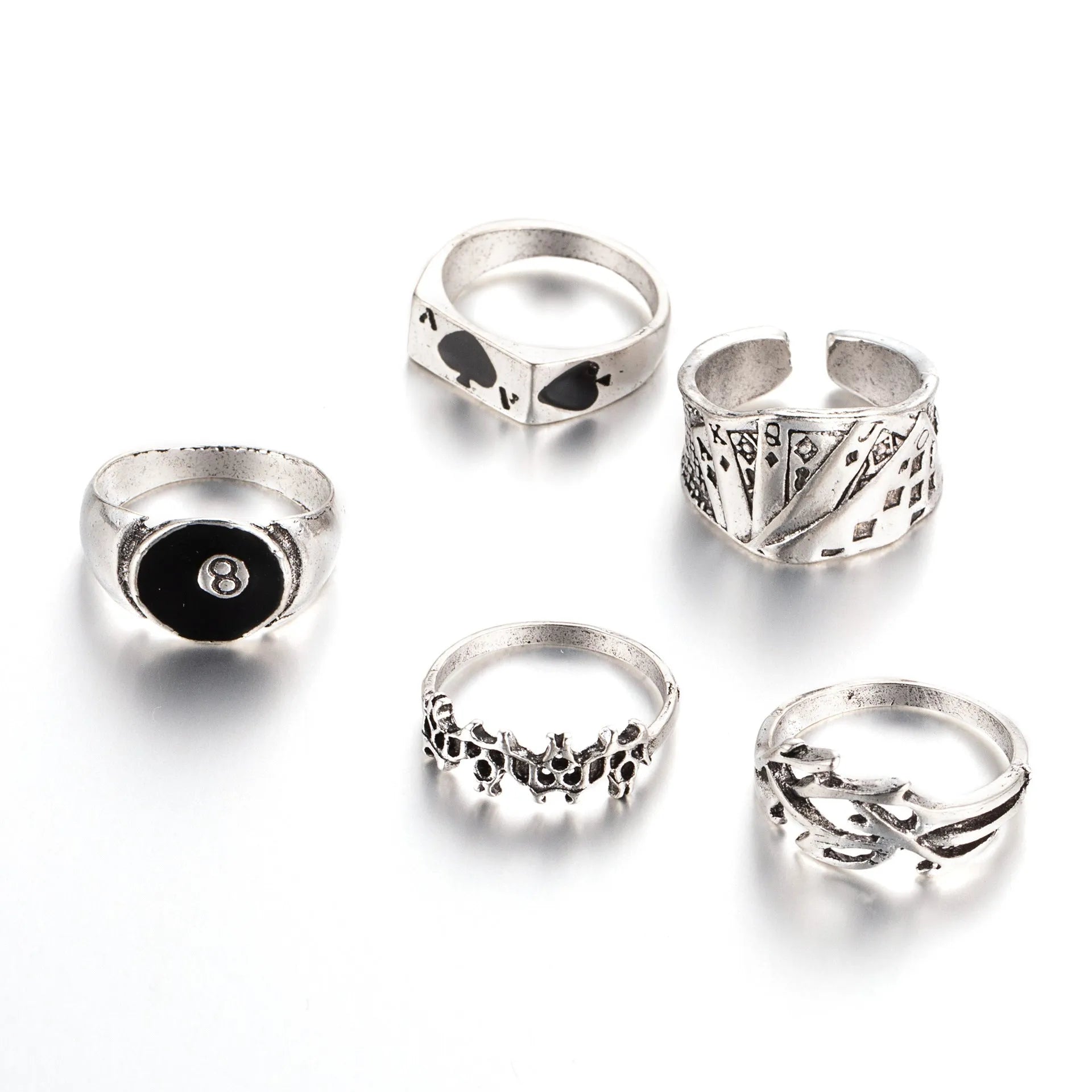 Black alloy poker ring with raised spade card design on adjustable band