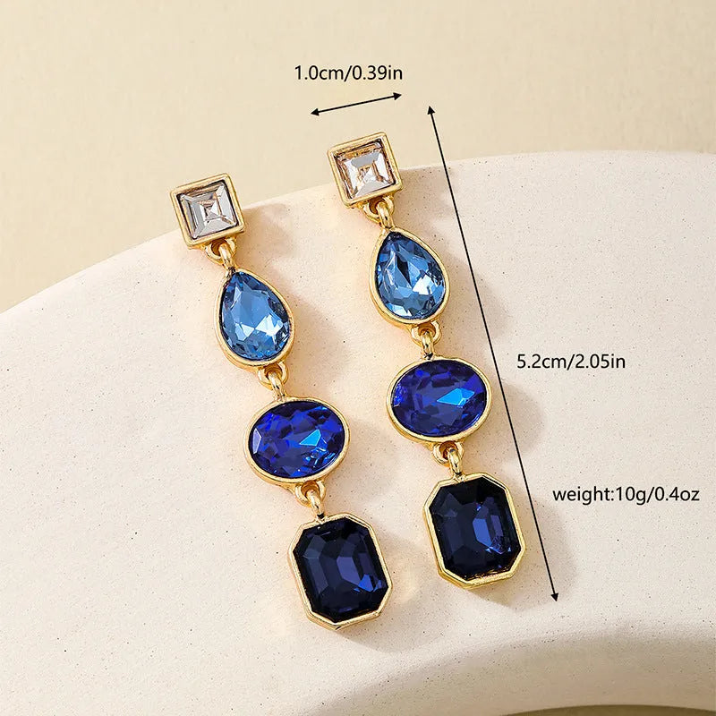 Pair of alloy geometric water drop stud earrings for women in rose red colour