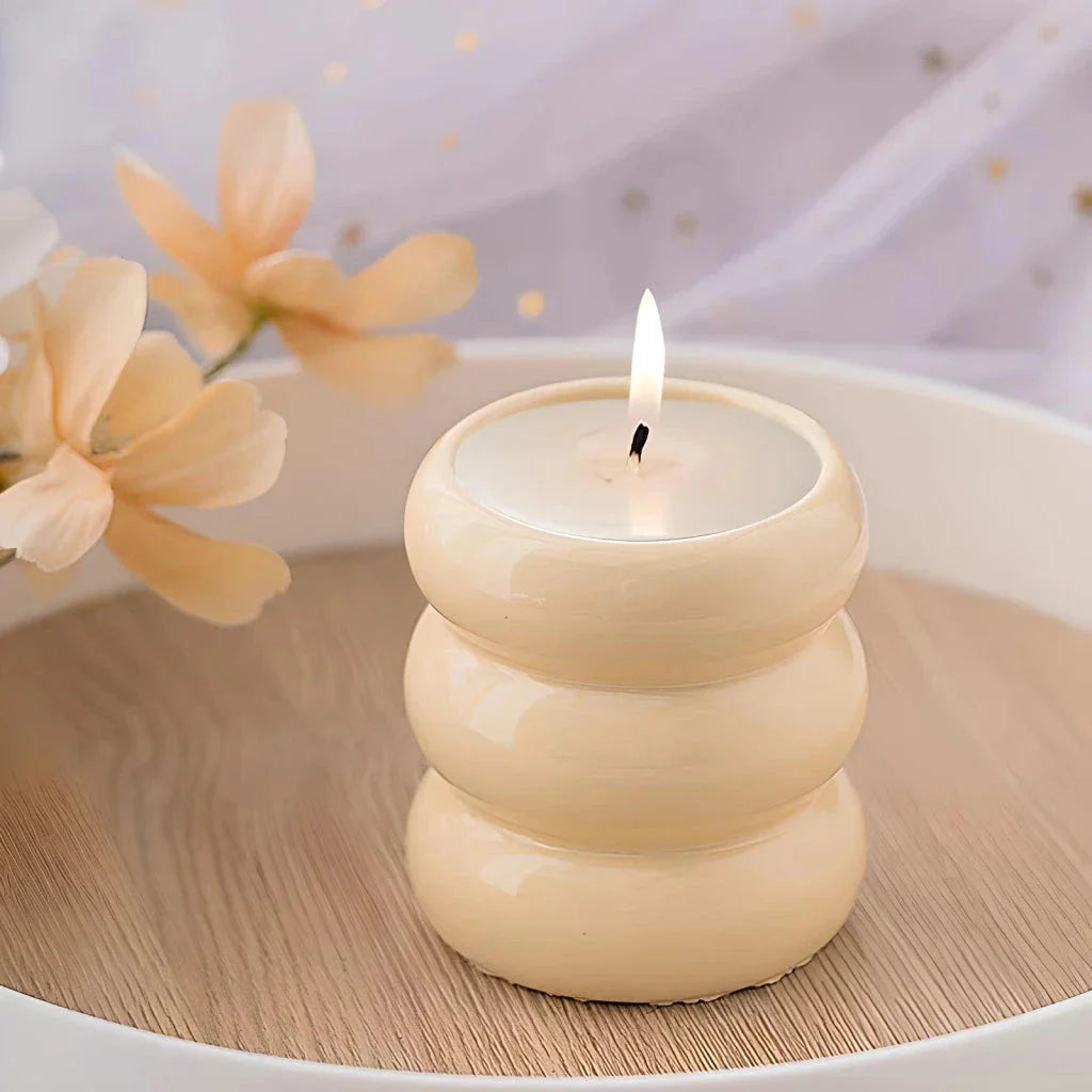 Nordic-inspired ceramic candle holder with a sleek, white finish and simple lines for elegant home decor