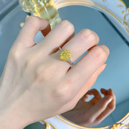 Stylish silver ring featuring a meticulously cut yellow diamond, showcasing Trendha's commitment to quality and innovation.