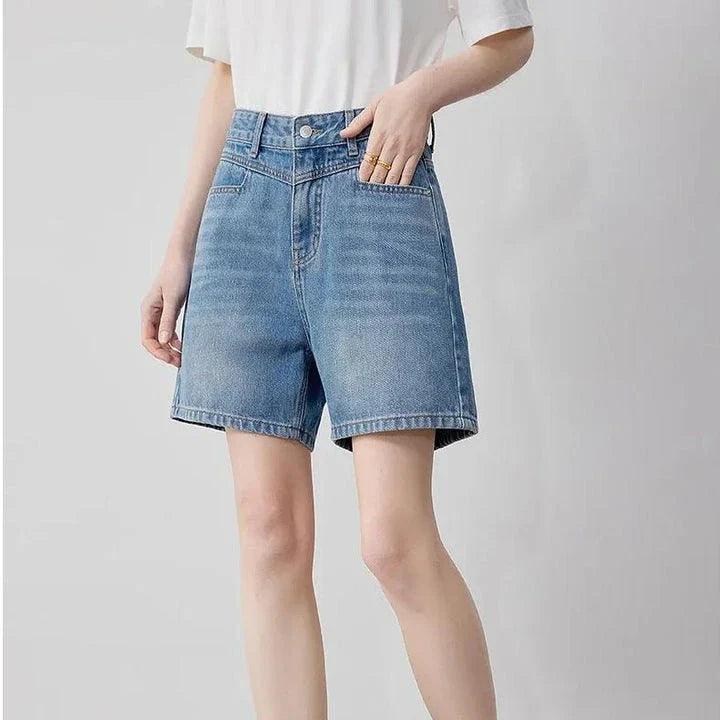 High-waisted denim shorts for women, featuring a straight-leg cut, practical pockets, and premium cotton construction for durability and comfort.