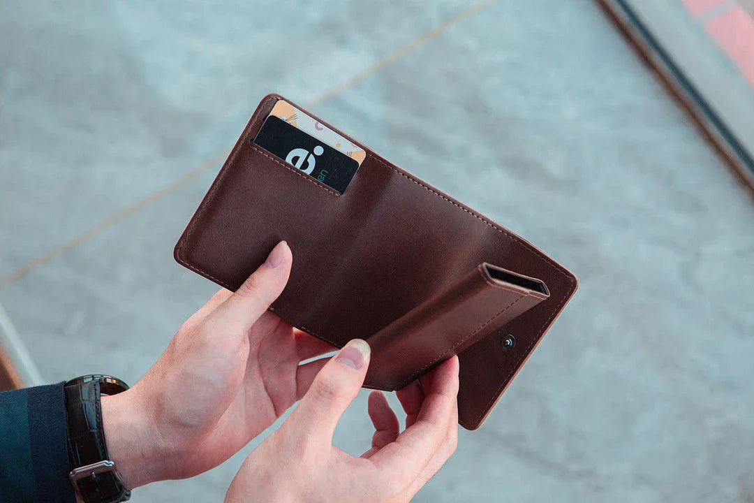 A stylish tri-fold wallet made of premium PU leather, featuring a magnetic buckle closure and available in a range of classic Kiwi-approved colors.