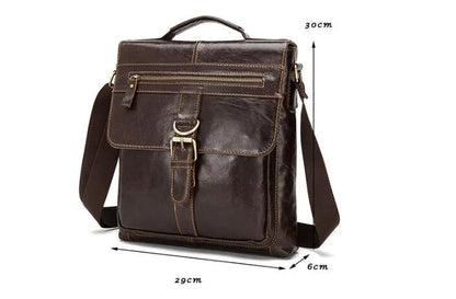 Premium retro-style messenger bag made from durable New Zealand cowhide with versatile interior organization and hands-free single strap design.