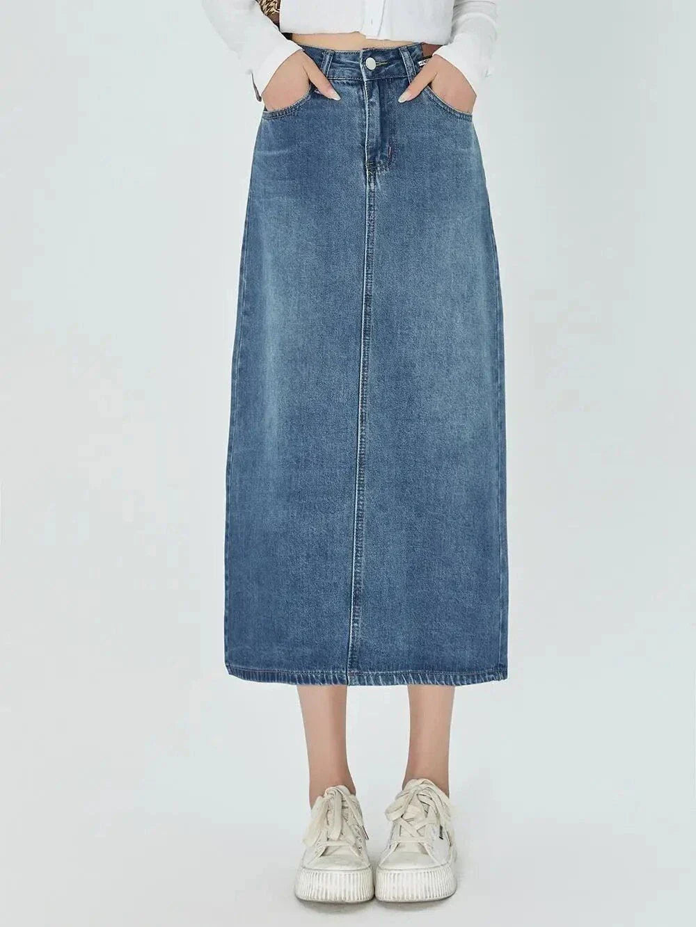 Timeless and Comfortable Kiwi-Chic A-Line Midi Denim Skirt - A versatile and stylish denim skirt with a classic A-line silhouette and mid-calf length