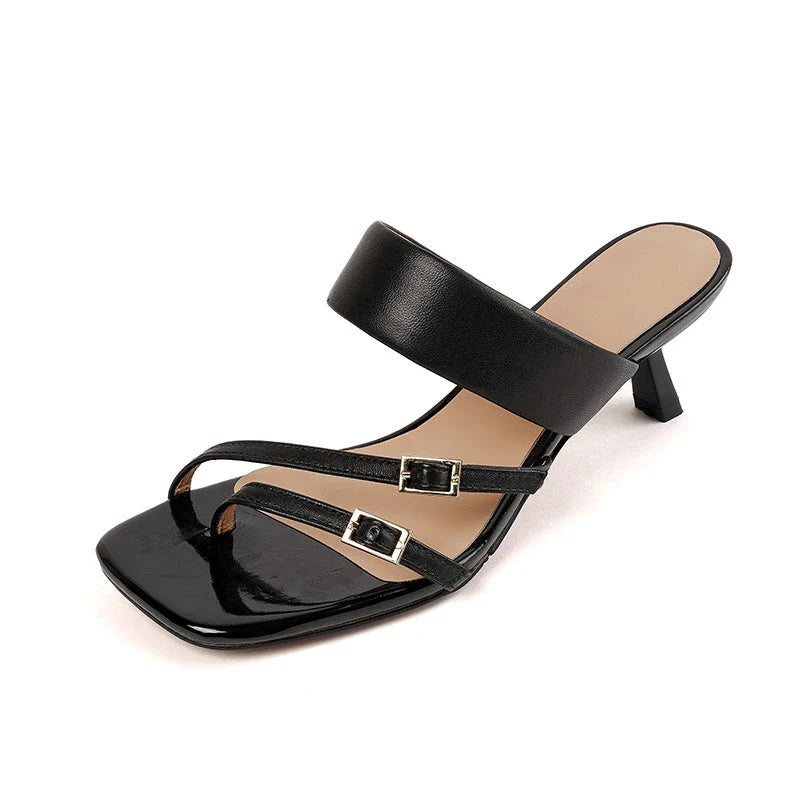 Stylish black leather sandals with a 5.5cm high heel, featuring a chic buckle detail and a slip-resistant outsole for all-day comfort and confidence.