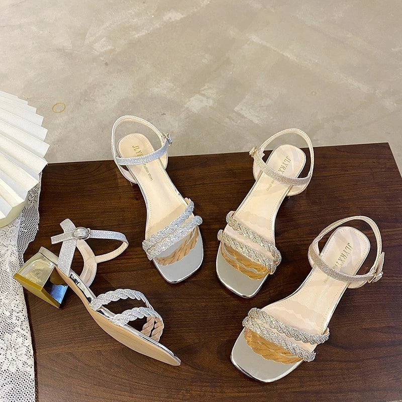 Stylish high-heeled sandals with thick soles in silver and gold colors, perfect for fashionable women in New Zealand.