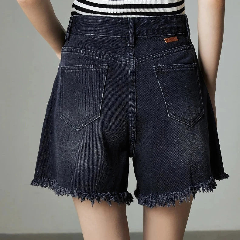 Premium high-waisted denim shorts with playful tassel detailing, perfect for summer outings in New Zealand