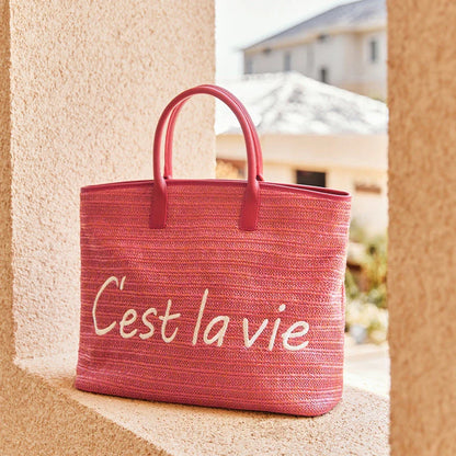 Stylish straw tote bag with trendy letter decoration, perfect for Kiwi women's casual summer style