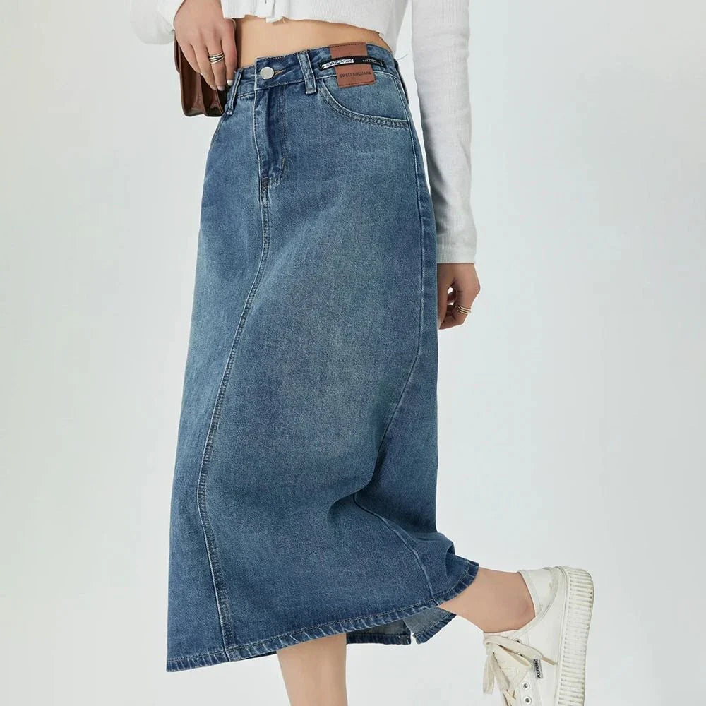 Timeless and Comfortable Kiwi-Chic A-Line Midi Denim Skirt - A versatile and stylish denim skirt with a classic A-line silhouette and mid-calf length